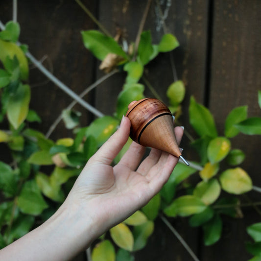 pawn spinning top